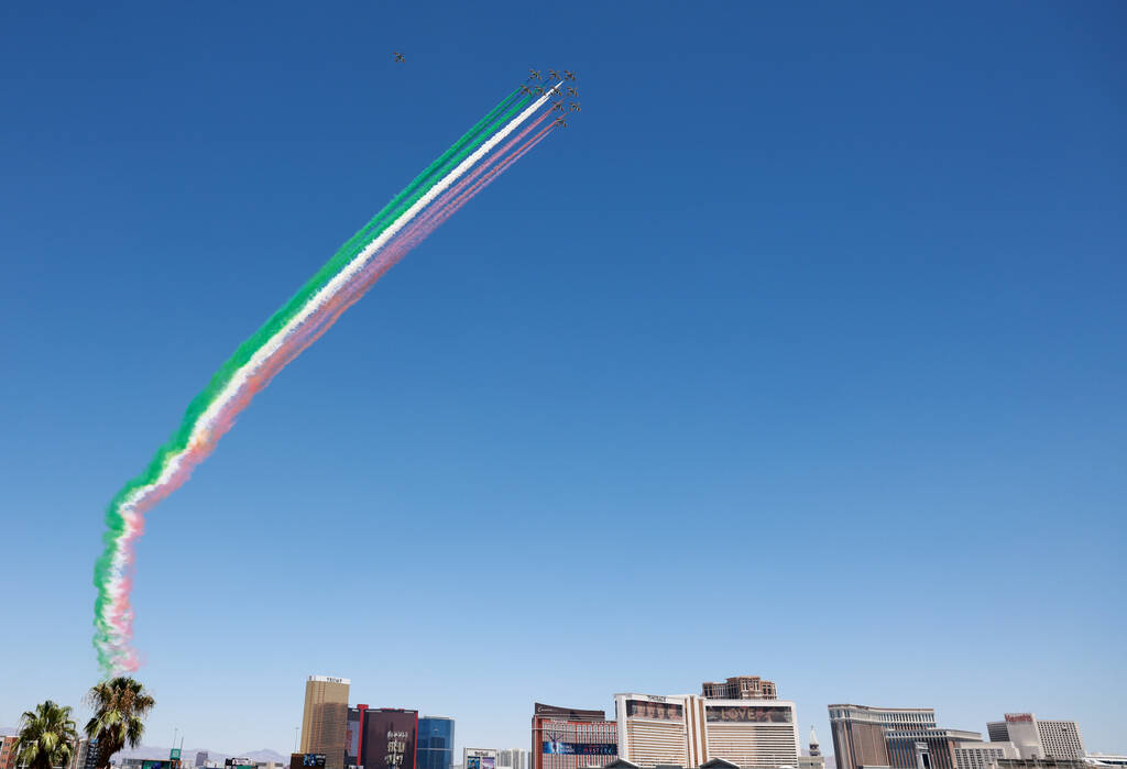 The Italian Air Force’s aerial demonstration team, Aeronautica Militare, flies over the ...