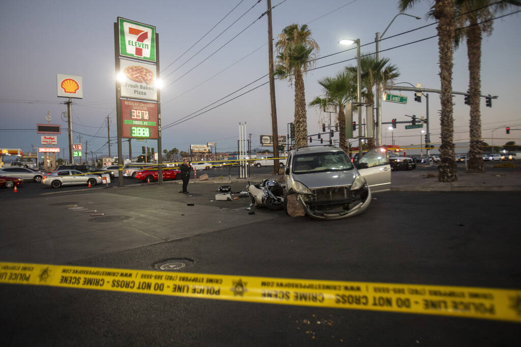Crews from the Metropolitan Police Department investigate a crash scene at the 7-Eleven on Sout ...
