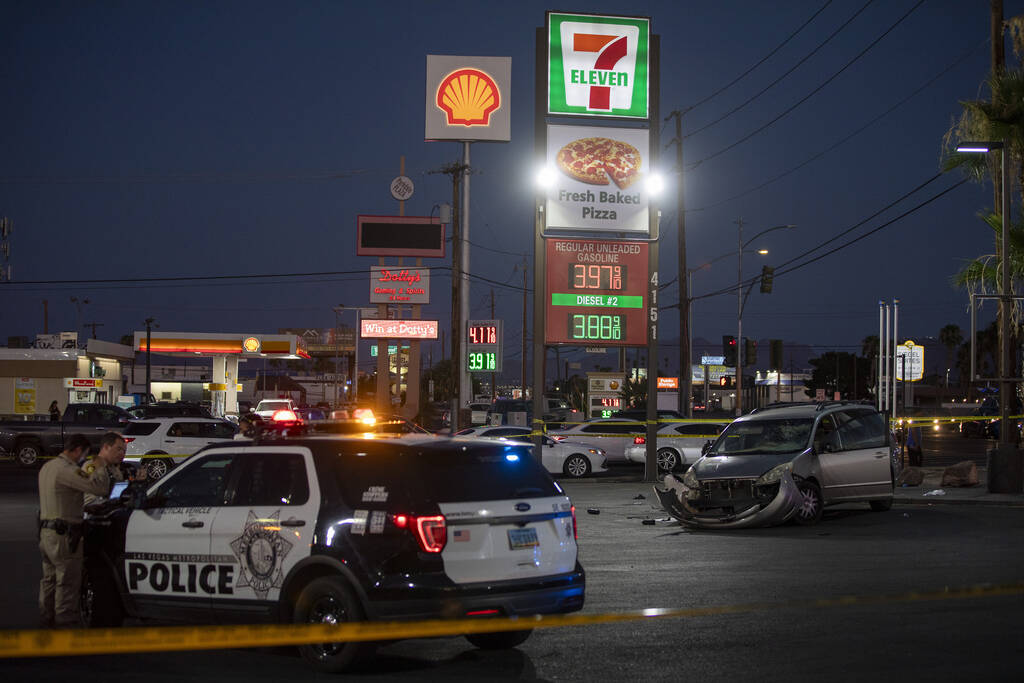 Crews from the Metropolitan Police Department investigate a crash scene at the 7-Eleven on Sout ...