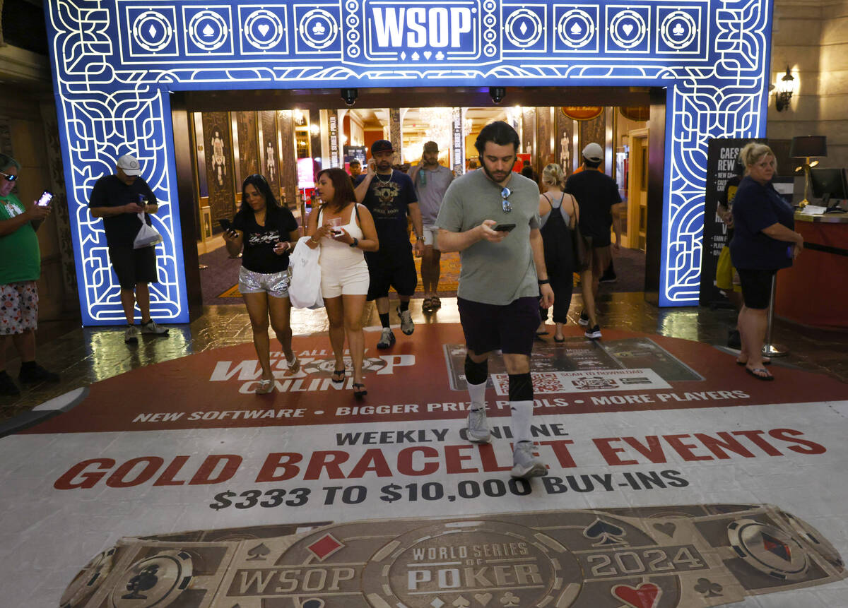 People arrive at Horseshoe hotel-casino during the first day of the World Series of Poker Main ...