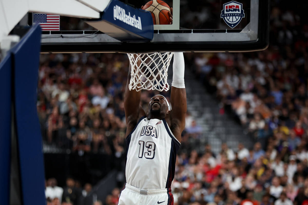 USA center Bam Adebayo (13) dunks the ball during the first half of a showcase basketball game ...