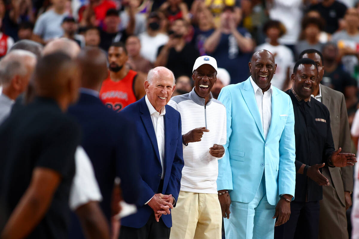 Former USA Olympic basketball players are honored during a showcase basketball game between the ...