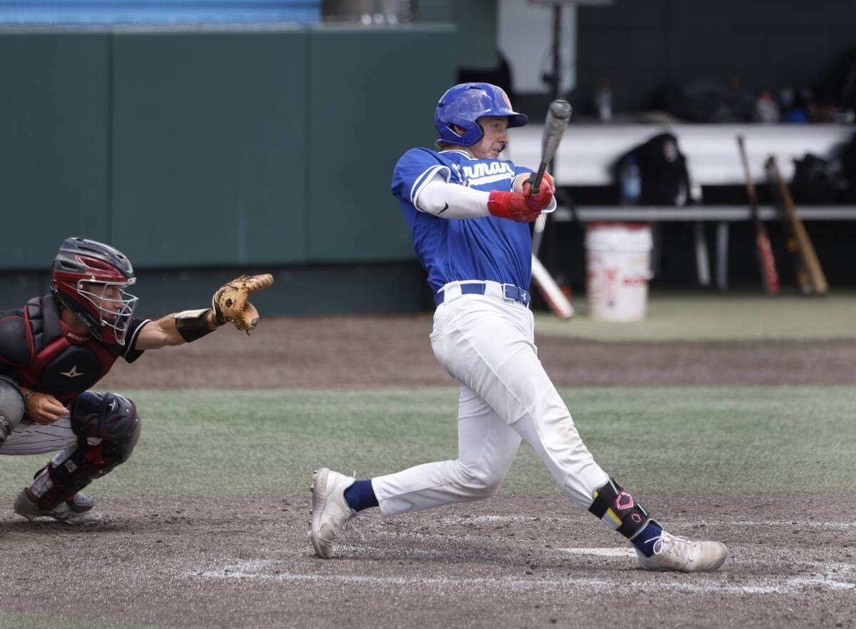 Bishop Gorman's Burke Mabeus connects for a hit against Desert Oasis during a Class 5A high sch ...