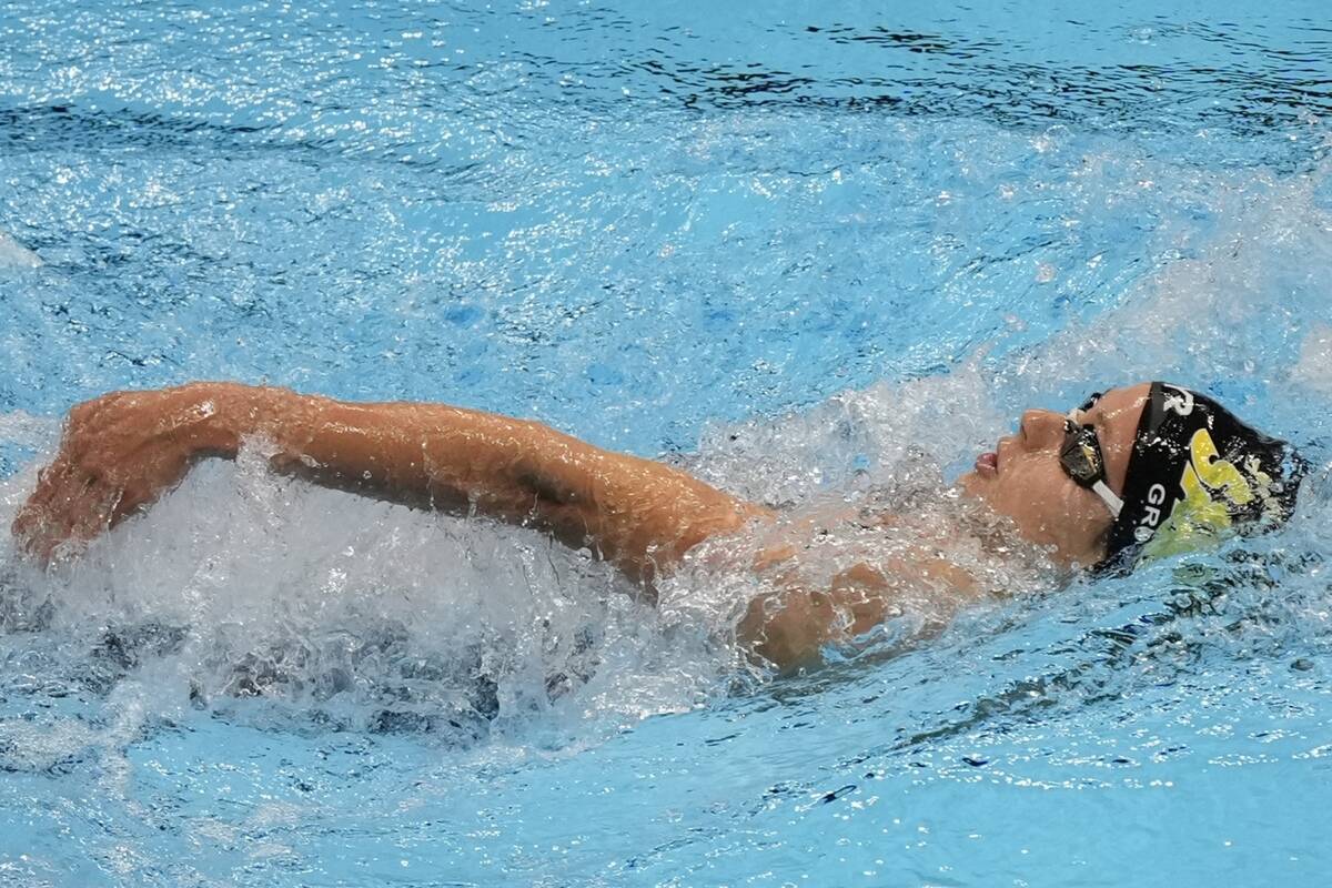 Katie Grimes swims during a Women's 200 backstroke preliminary heat Thursday, June 20, 2024, at ...