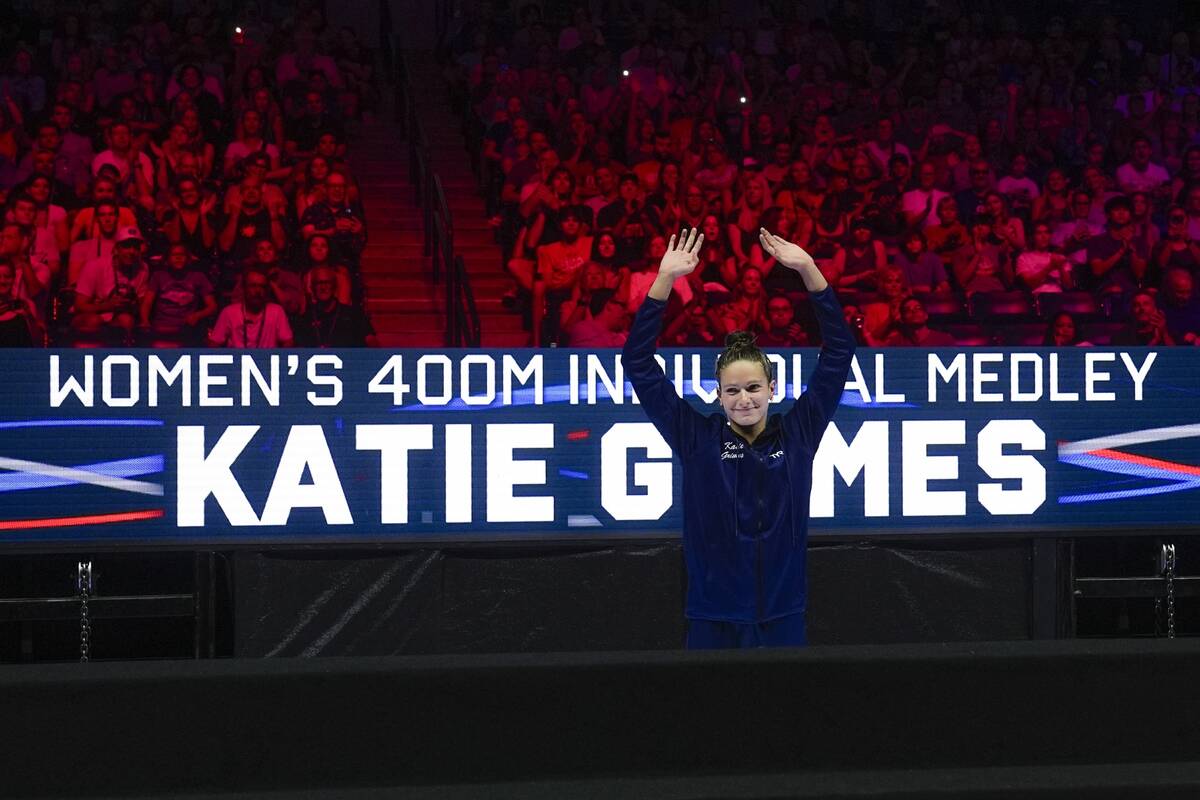 Katie Grimes celebrates after winning the Women's 400 individual medley finals Monday, June 17, ...