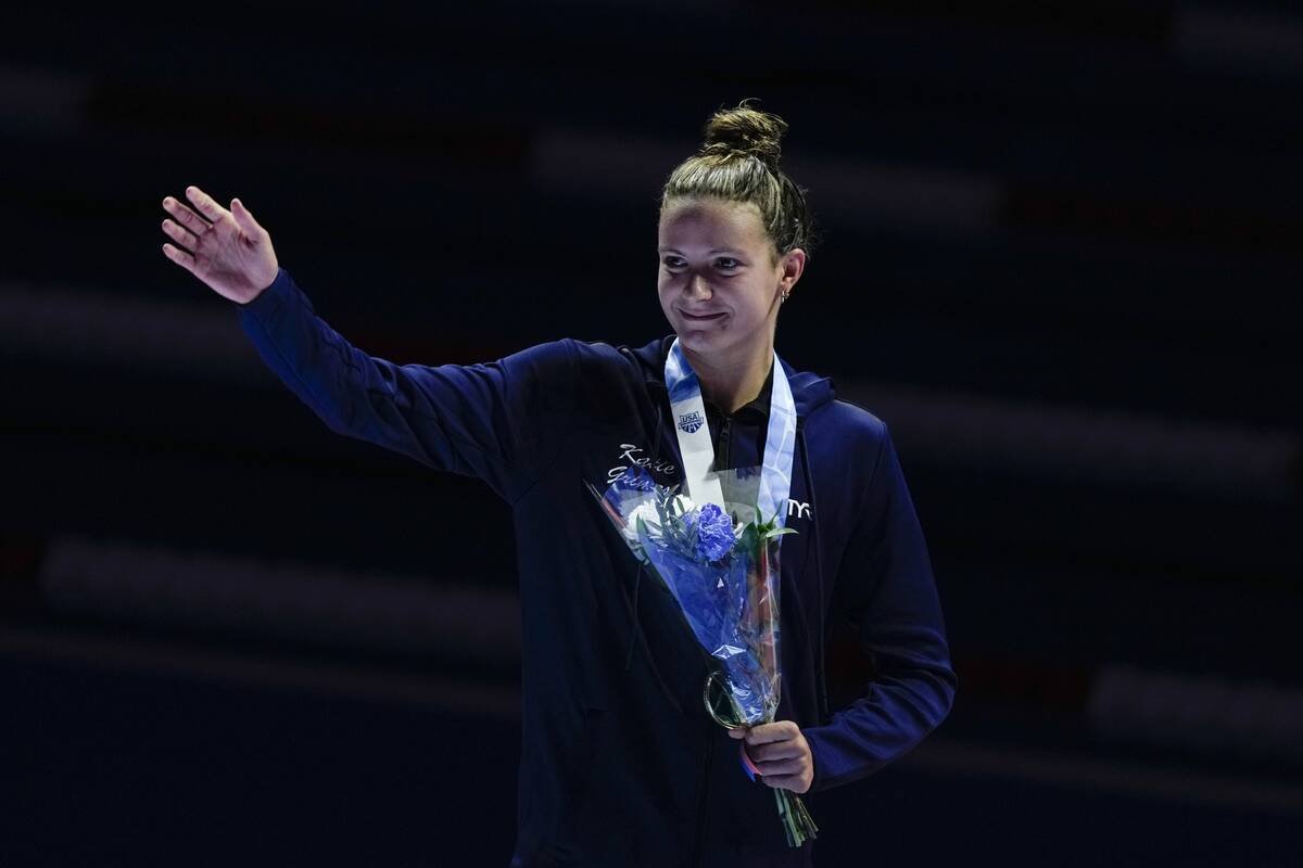Katie Grimes celebrates after winning the Women's 400 individual medley finals Monday, June 17, ...