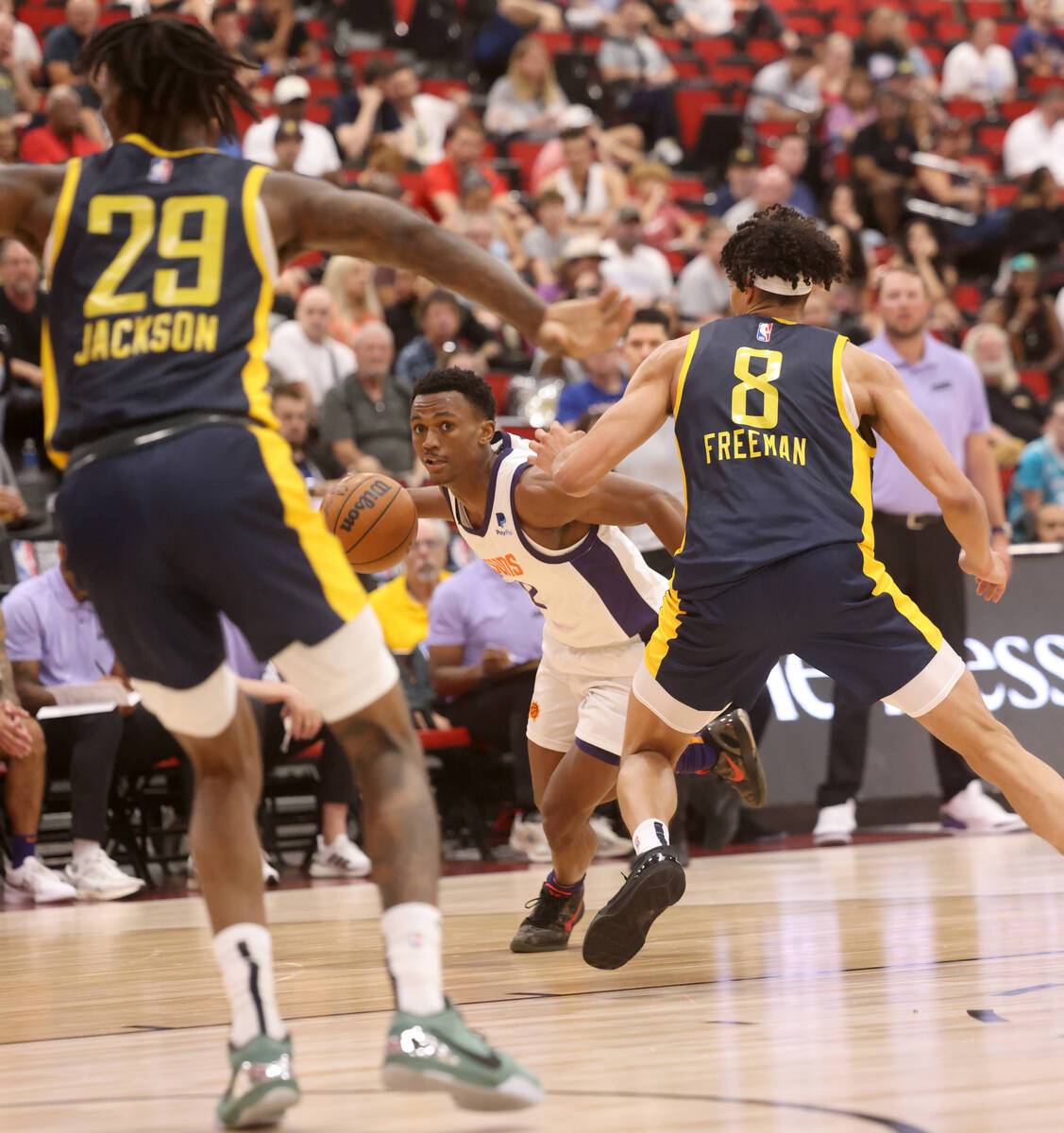 Phoenix Suns guard Tyson Walker (12) drives against the Indiana Pacers during an NBA Summer Lea ...