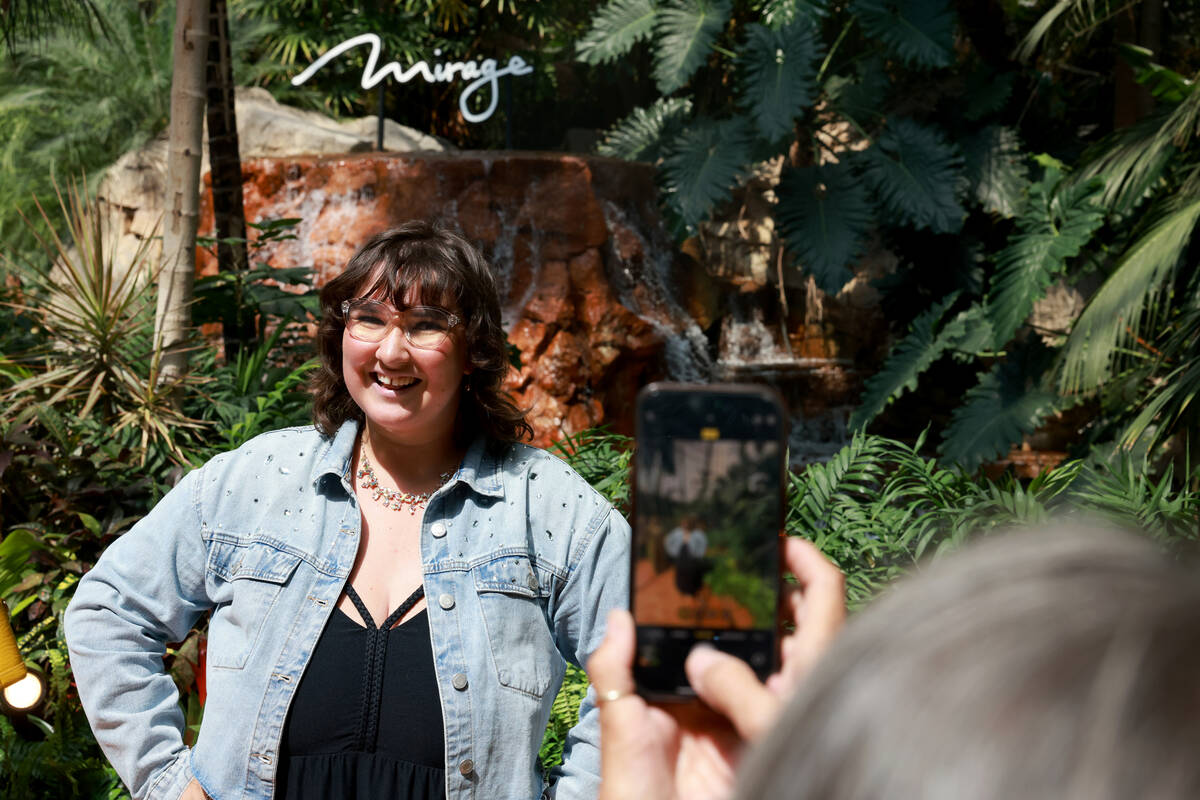 Lucy Angelo, whose first job was at The Mirage, poses for a photo on the final day of operation ...