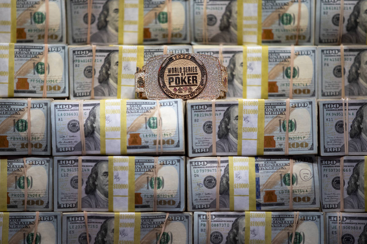 The cash prize and bracelet are displayed on the final table of the World Series of Poker Main ...
