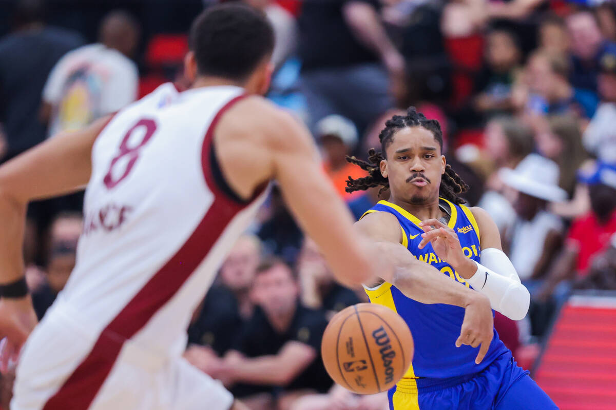 Golden State Warriors guard Yuri Collins (99) throws the ball during an NBA Summer League game ...
