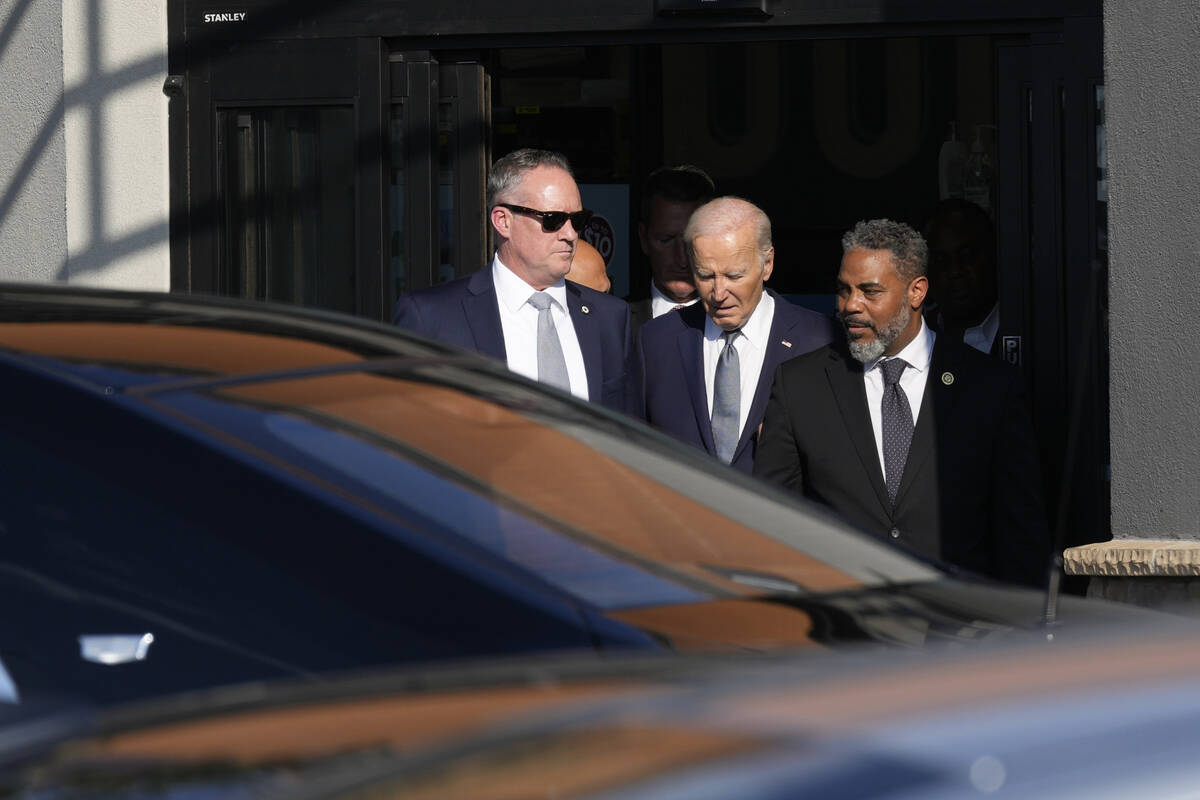 President Joe Biden leaves with Rep. Steve Horsford, D-Nev., after visiting Mario's Westside Ma ...
