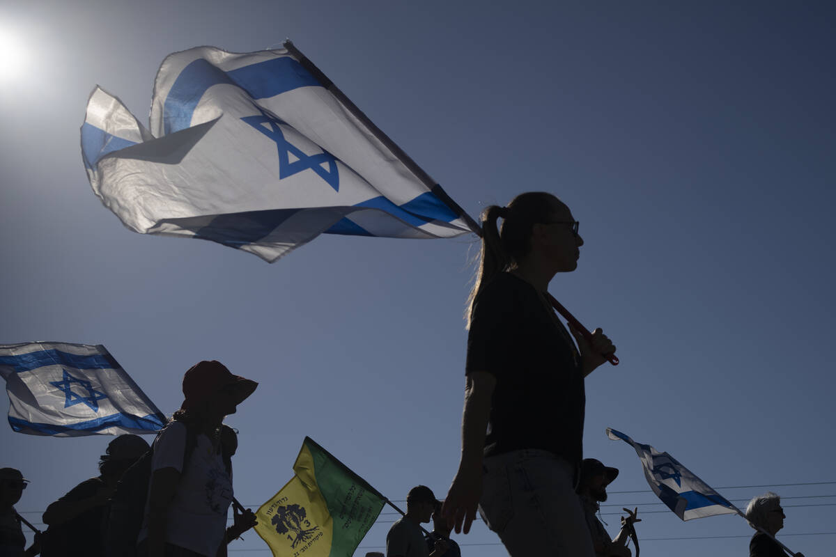 Relatives and friends of Israeli soldiers who were killed and of those who were kidnapped durin ...