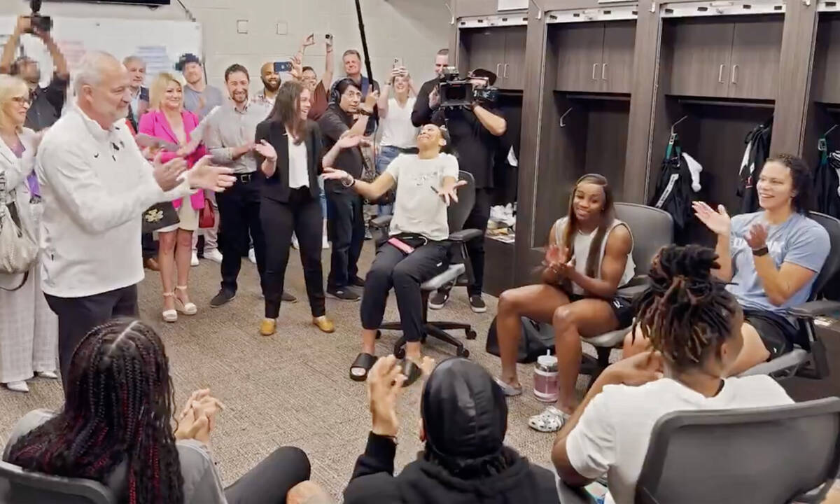 Aces players react as LVCVA CEO and President Steve Hill announces a $100,000 per player sponso ...