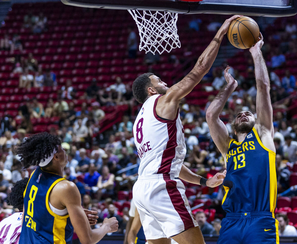 Cleveland Cavaliers center Pete Nance (8) rejects a shot by Indiana Pacers forward Samson Froli ...