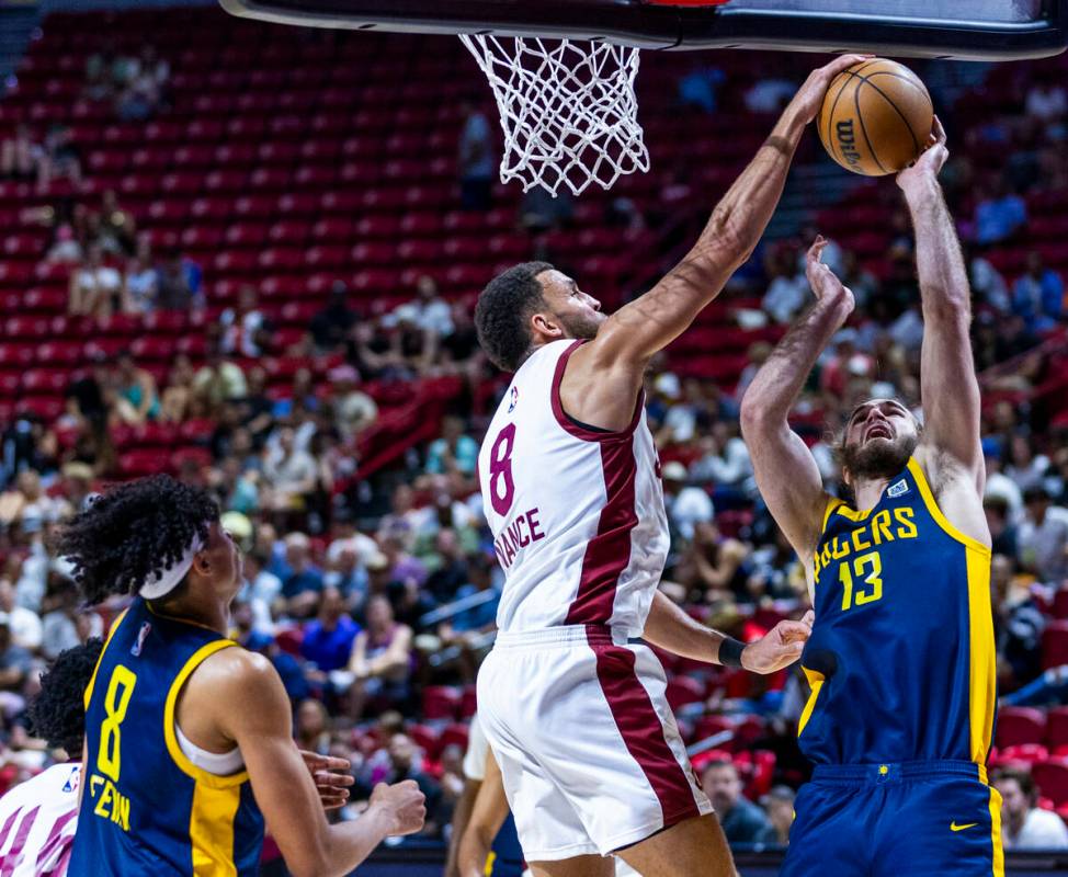 Cleveland Cavaliers center Pete Nance (8) rejects a shot by Indiana Pacers forward Samson Froli ...
