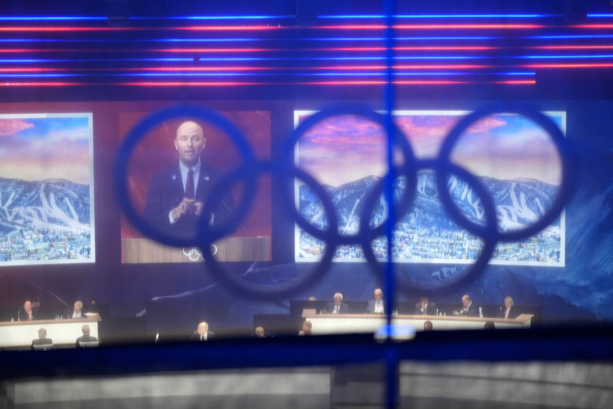 Utah Gov. Spencer Cox speaks about Salt Lake City's bid to host the 2034 Winter Olympics, durin ...