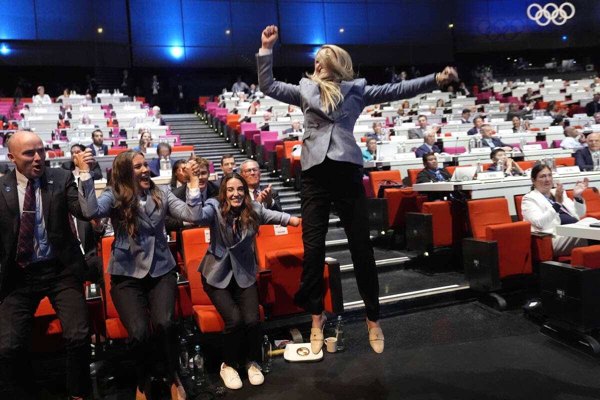 Former US skier Lindsey Vonn jumps after Salt Lake City was named Olympics host again as the IO ...