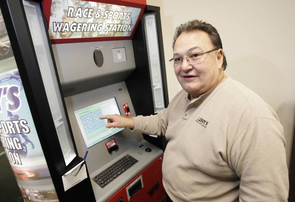 American Wagering CEO, Vic Salerno with a kiosk, Tuesday morning, January 11, 2005. (Las Vegas ...