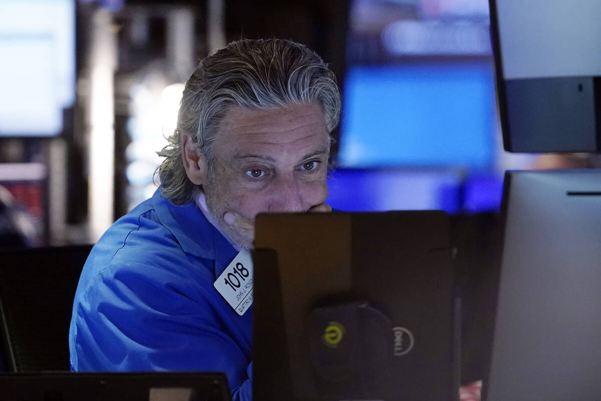 FILE - Trader John Romolo works on the floor of the New York Stock Exchange, Aug. 2, 2024. Japa ...