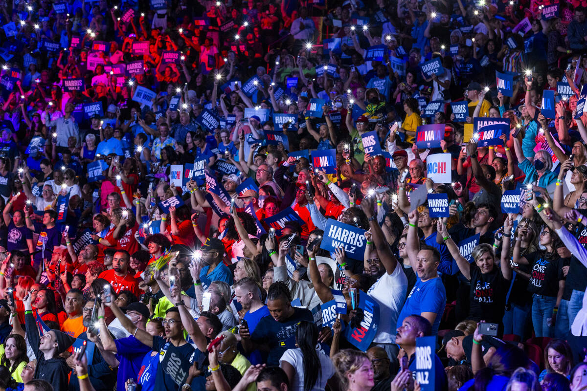 The crowd gets pumped up while dancing to music by DJ D-Nice as Vice President Kamala Harris an ...