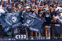Raiders fans cheer for the team during an open practice at Allegiant Stadium on Tuesday, Aug. 2 ...