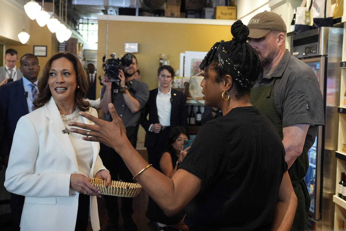Democratic presidential nominee Vice President Kamala Harris talks during a stop at Dottie's Ma ...