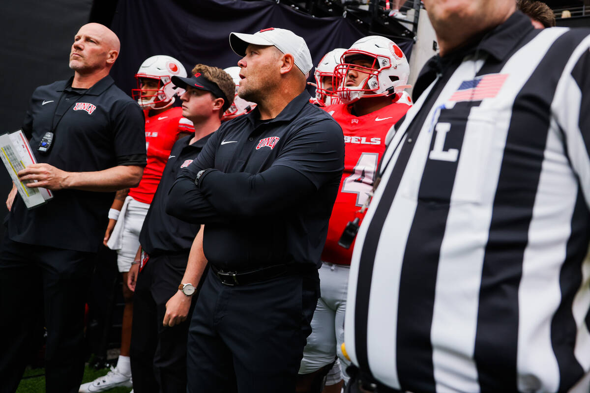 UNLV head coach Barry Odom waits to take the field during an NCAA football game between UNLV an ...