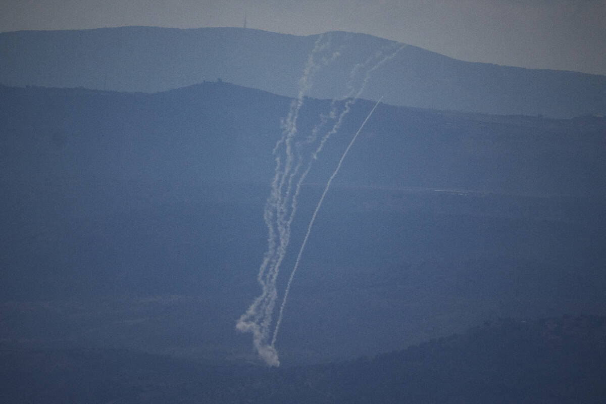 Israeli Iron Dome air defense system fires to intercept rockets that were launched from Lebanon ...