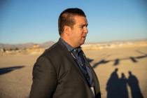 Andrew Bennett, director of the Clark County Department of Traffic Safety, visits the scene of ...