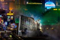 The Tropicana is imploded early in the morning while viewed from the Foundation Room at the Man ...