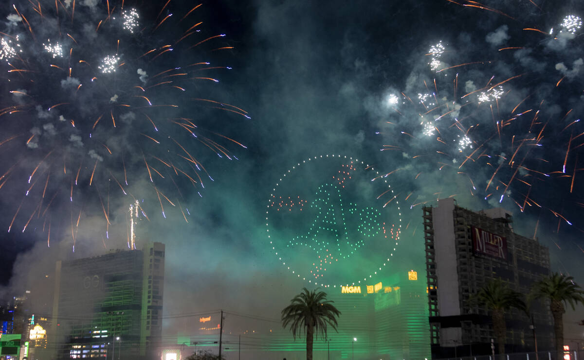 Drones and fireworks light up the sky before the Tropicana implosion, Wednesday, Oct. 9, 2024, ...