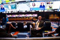 Casino owner Derek Stevens points to the display at the Circa Sportsbook on Monday, Oct. 19, 20 ...