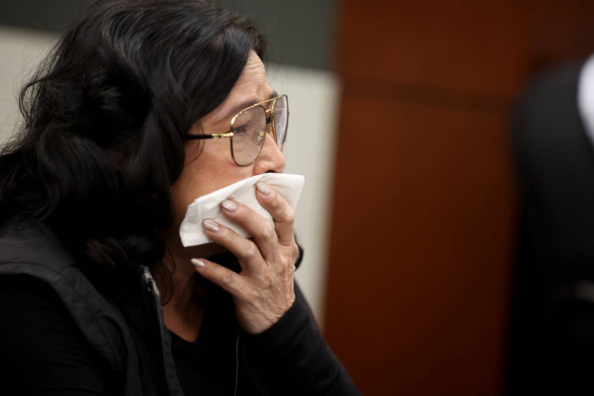 Mother of murder victim Sang Boi Nghia reacts during the murder trial of Julius Trotter at the ...