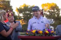 J.T. Poston holds the trophy after winning the Shriners Children’s Open at TPC Summerlin ...