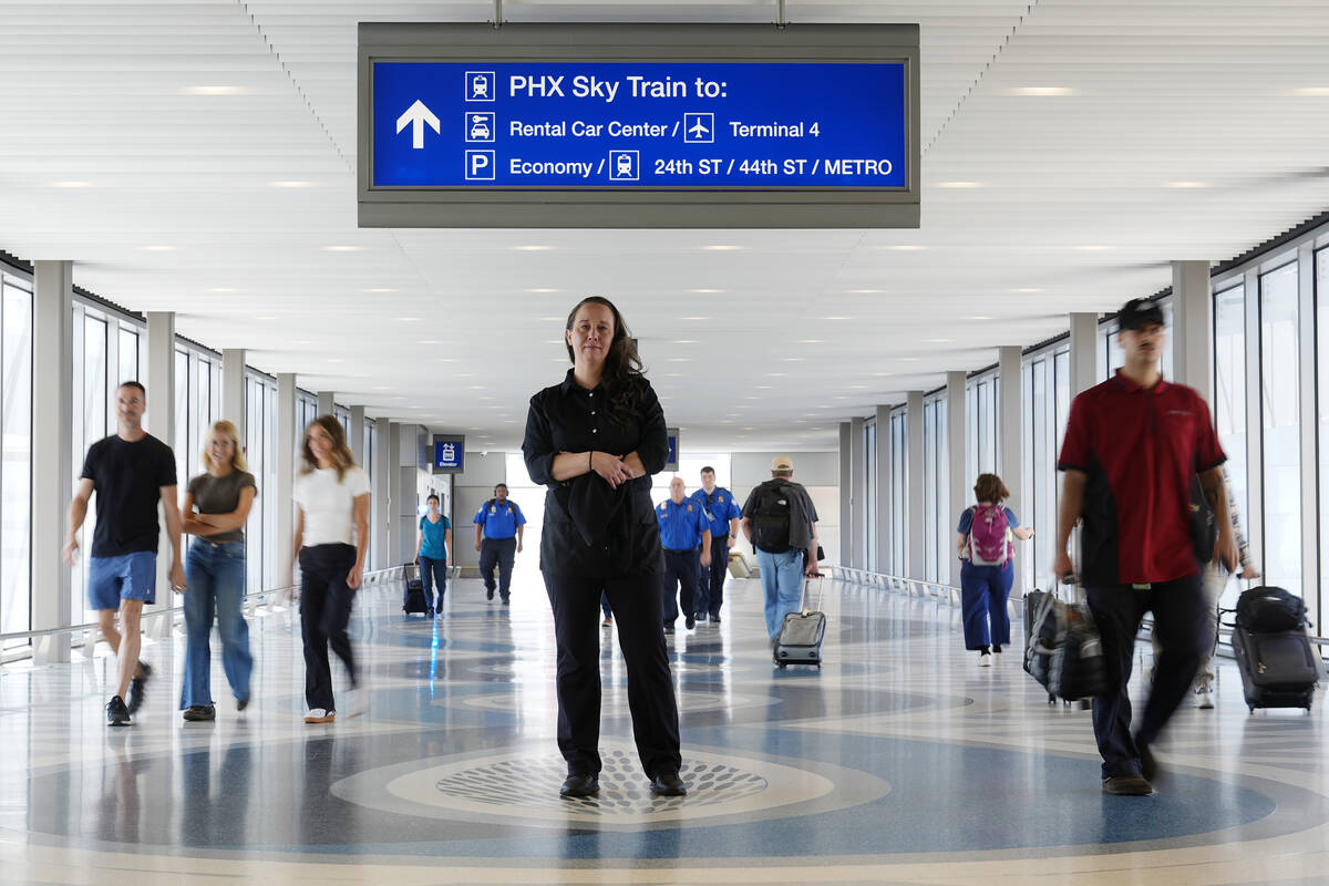 Lindsay Ruck, a server at Phoenix Sky Harbor International Airport restaurants, pauses in Termi ...