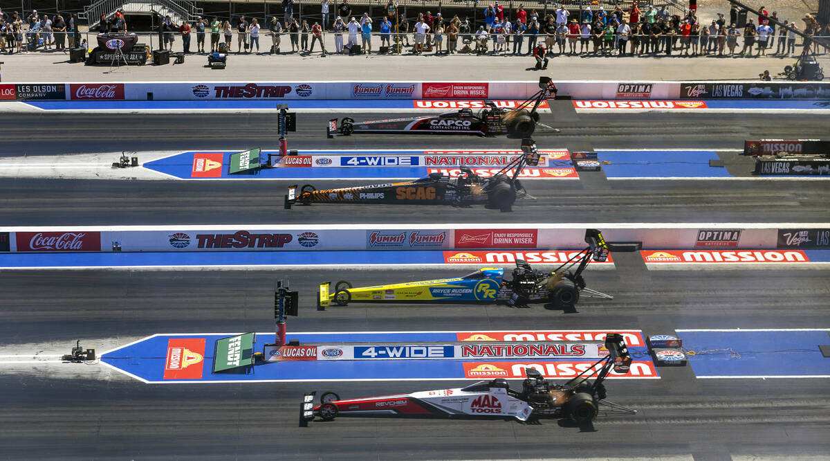 Top Fuel drivers Doug Kalitta, Tony Stewart, Justin Ashley and Billy Torrence blast from the st ...