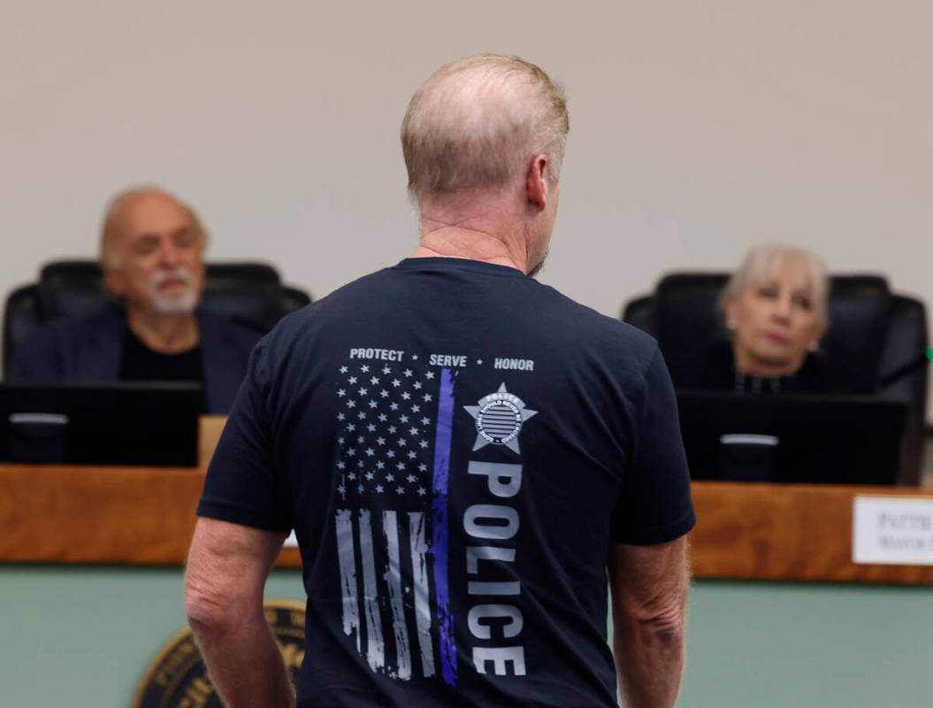 Mesquite Mayor Allan Litman, left, and Mayor Pro Tem Pattie Gallo listen as Shane Charles, a r ...