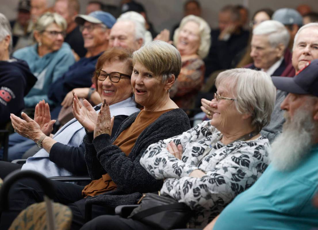 Attendees applaud in support of Mesquite Police Chief MaQuade Chesley during a City Council mee ...