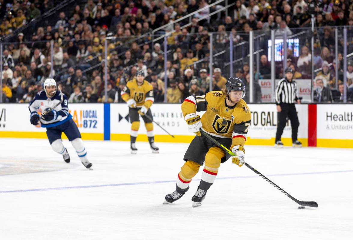 Golden Knights center William Karlsson (71) controls the puck during the NHL hockey game agains ...