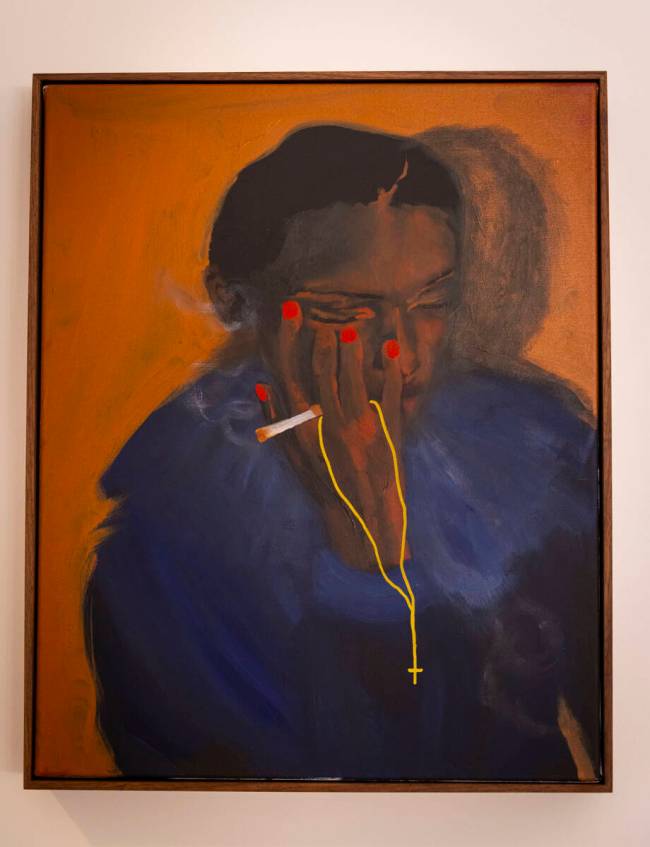 A painting by artist Danielle McKinney is seen on display at the home of Ralph DeLuca, an art a ...