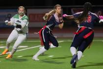 Coronado's Lauren Wood runs the ball after intercepting it from Green Valley during a flag foot ...
