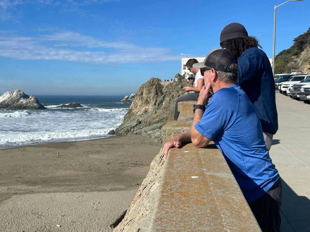 People watch the waves come in after an earthquake was felt widely across Northern California a ...
