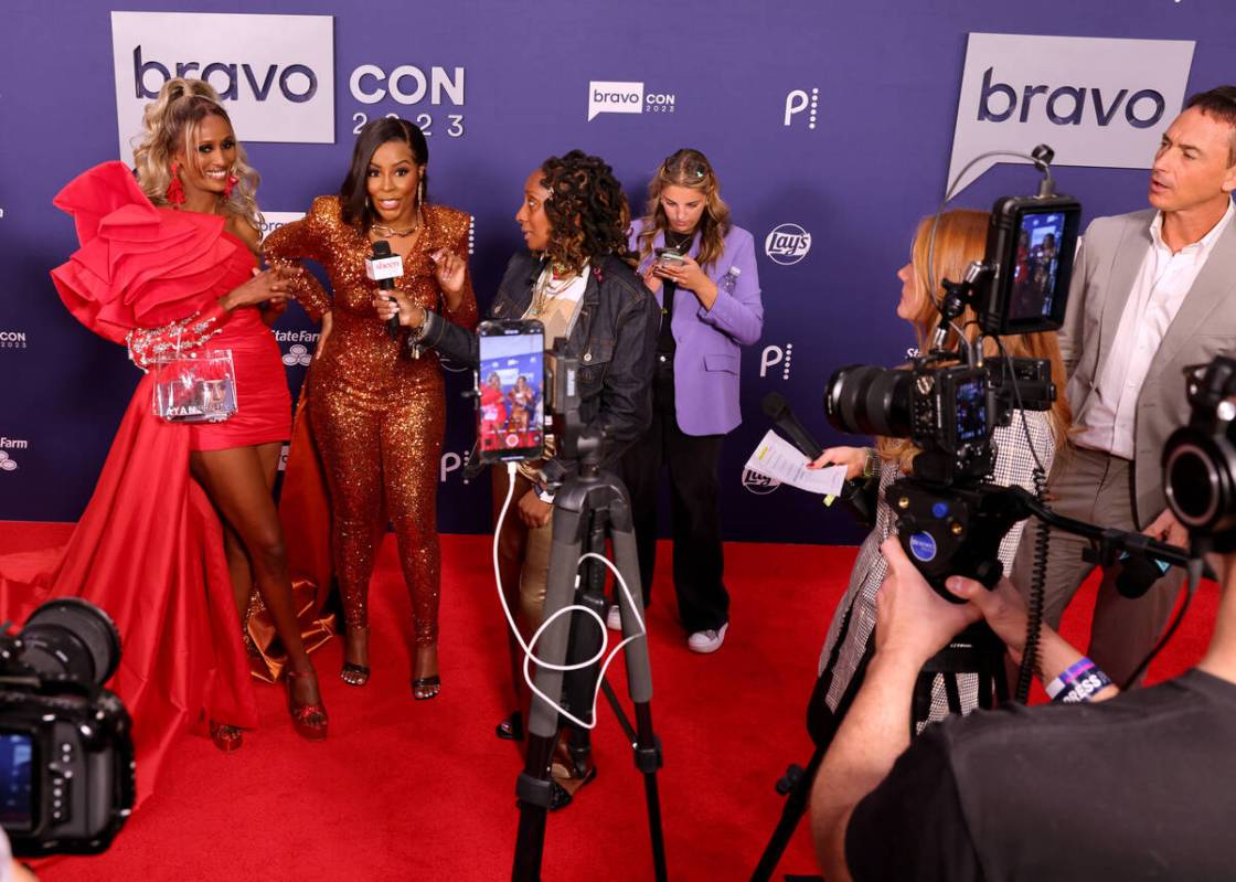 Chanel Ayan, left, and Caroline Brooks of The Real Housewives of Dubai talk to the media a ...