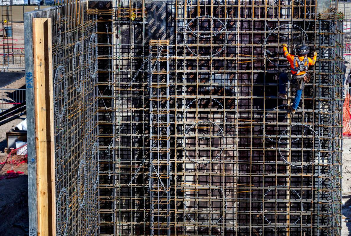 A construction crew begins to develop dual hotels during the AC/Element Symphony Park Hotel gro ...