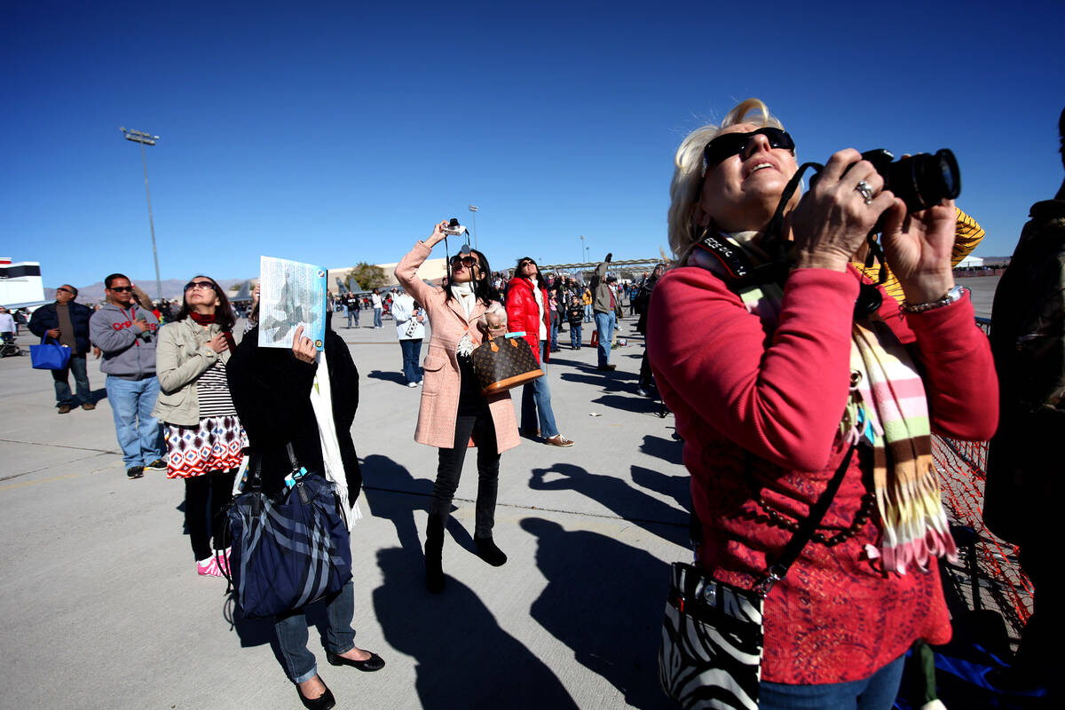 Maggie Eomurian (cq) of Las Vegas watches the Aviation Nation air show at Nellis Air Force Base ...