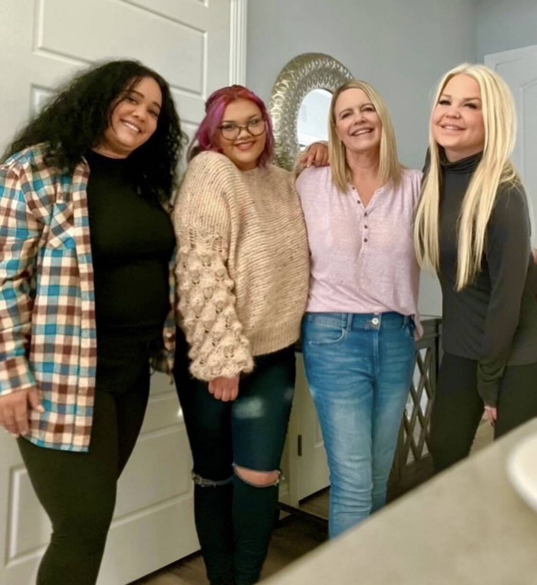 Renise "NeNe" Wolfe (left) smiles with sister Raygan Wolfe, mother Tracy Coleman and sister Ash ...