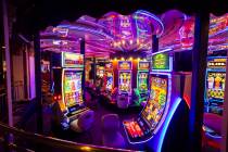 People play on a rotating floor of slot machines at Circus Circus on Wednesday, Dec. 11, 2024, ...