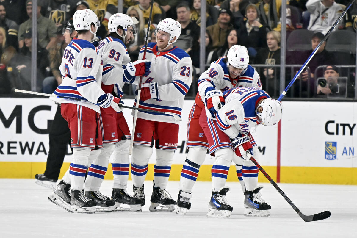 The New York Rangers celebrate after a goal by center Vincent Trocheck's (16) against the Vegas ...