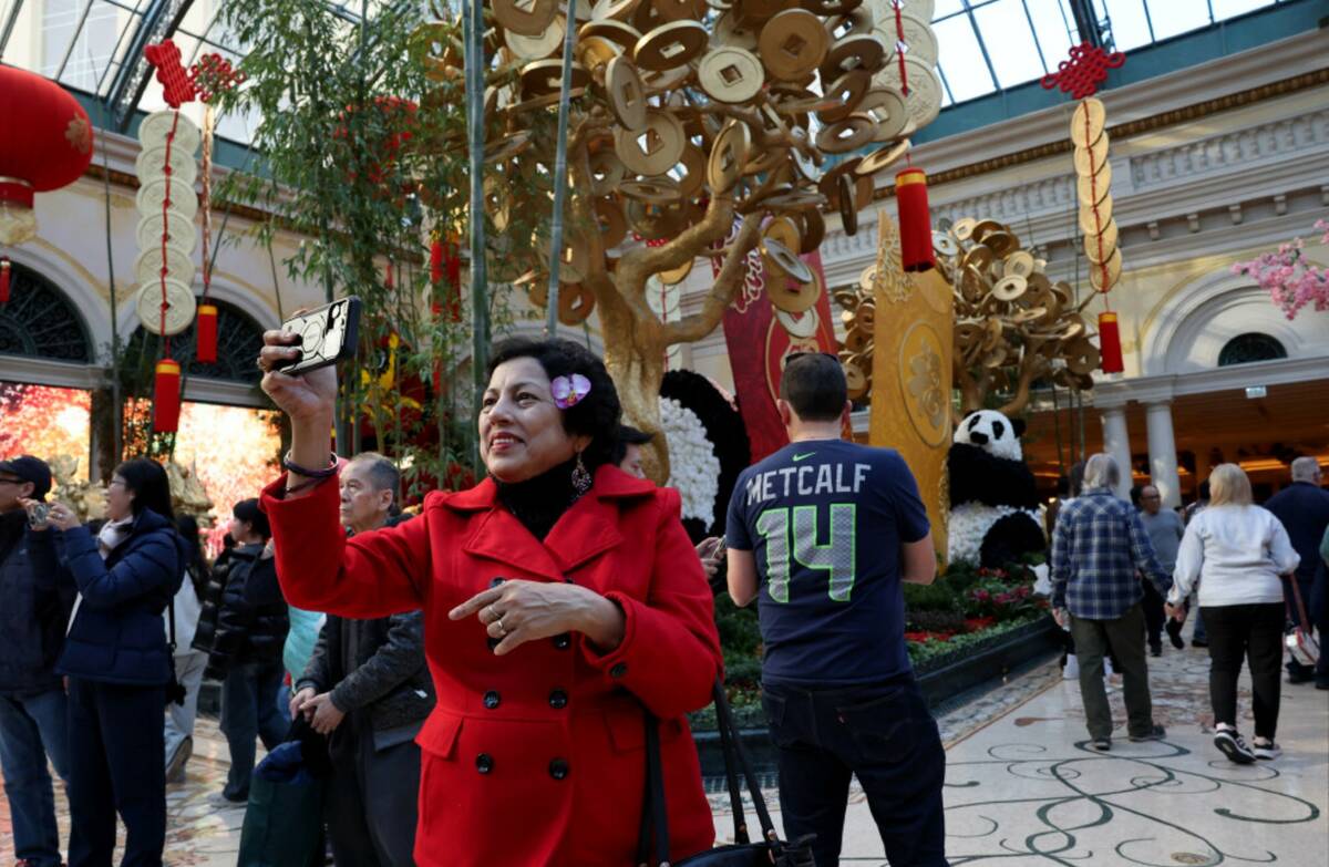 Seema Maithel of Santa Ana, Calif., takes in the Year of the Snake celebrating Lunar New Year a ...