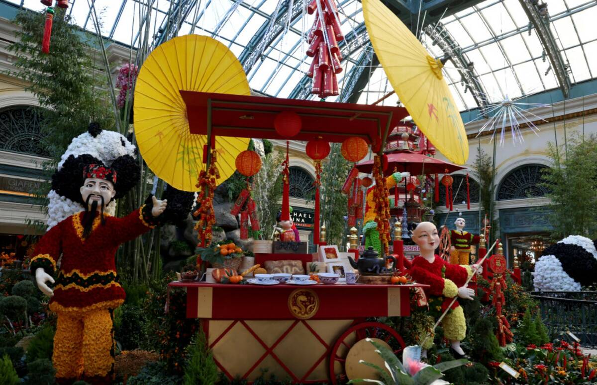 Guests take in the Year of the Snake celebrating Lunar New Year at Bellagio Conservatory & Bota ...